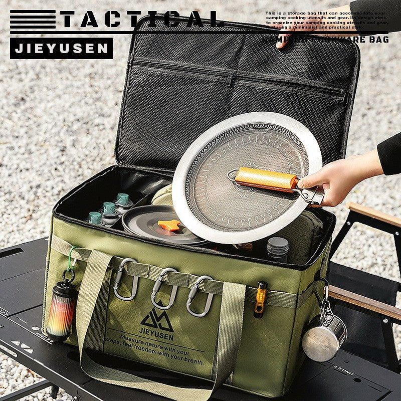 Open camping storage bag showing a pan and bottles packed inside